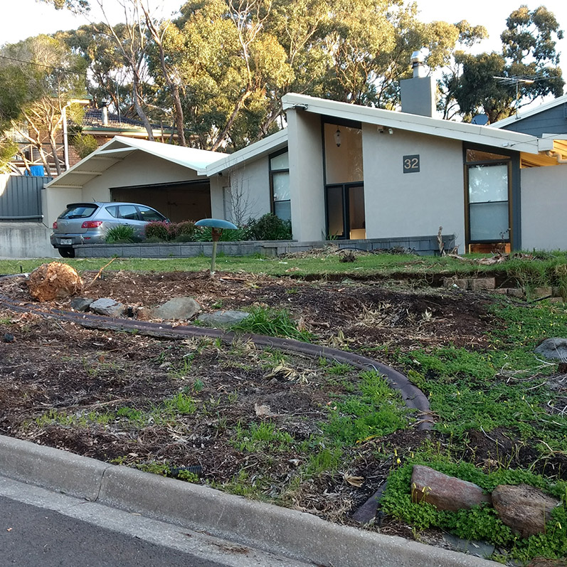 Holiday at home Front yard retaining walls Before