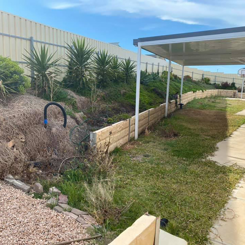 Chambos Earthworks Retaining Wall and Travertine Before