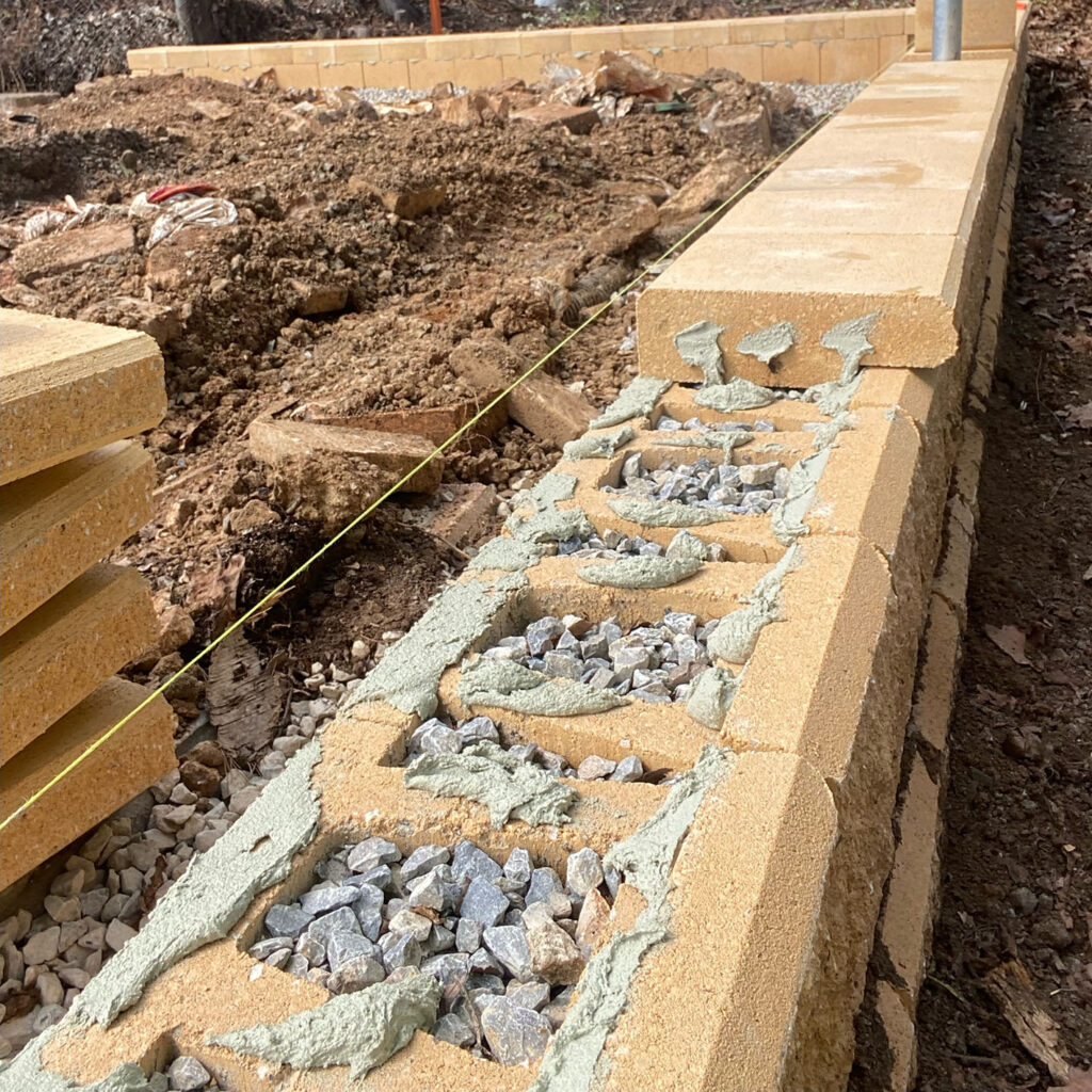 Fixing the caps Retaining Wall DIY